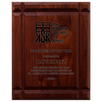 A photo of a solid wood Deep Groove Walnut plaque with a full-laser engraving.