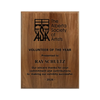 A photo of a solid wood traditional Walnut plaque with a full laser engraving. 