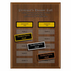 A photo of a multiplate Annual Walnut plaque with 12 name plates, and a laser-engraved header.