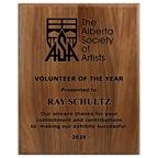 A photo of a solid wood traditional Walnut plaque with a full laser engraving. 
