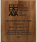 A photo of a solid wood traditional Walnut plaque with a full laser engraving.