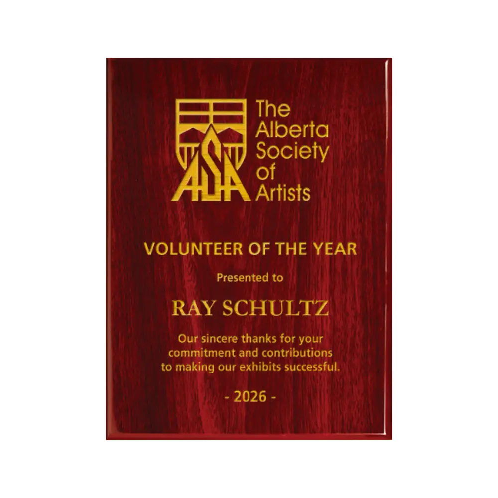 A photo of a Rosewood Piano Finish plaque with full laser engraved text and graphics, and colour fill.