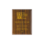 A photo of a Walnut Piano Finish plaque with full laser engraved text and graphics, and colour fill.