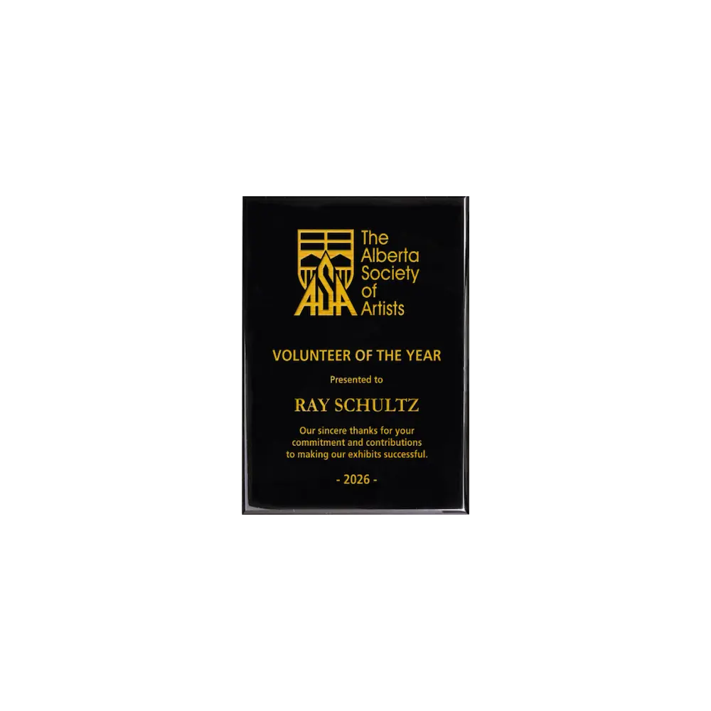 A photo of a Black Piano Finish plaque with full laser engraved text and graphics, and colour fill.