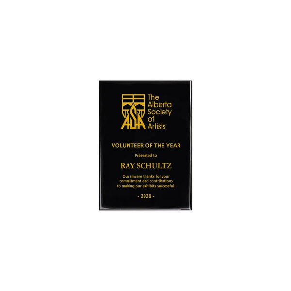 A photo of a Black Piano Finish plaque with full laser engraved text and graphics, and colour fill.