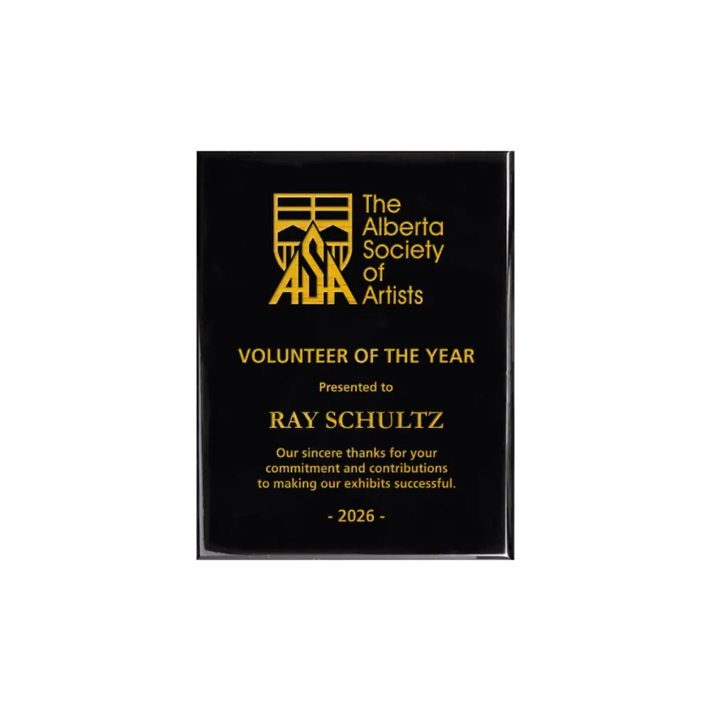 A photo of a Black Piano Finish plaque with full laser engraved text and graphics, and colour fill.