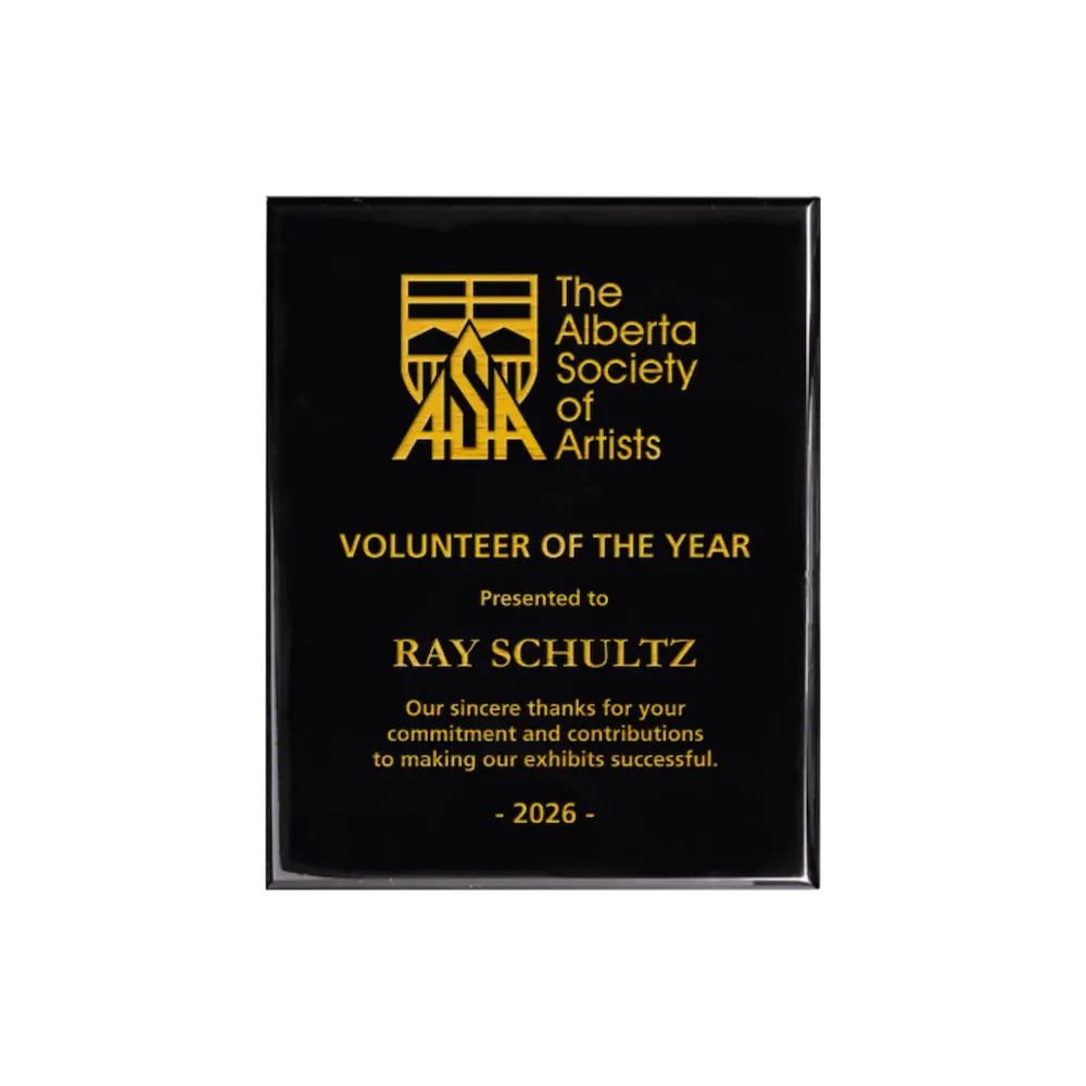 A photo of a Black Piano Finish plaque with full laser engraved text and graphics, and colour fill.