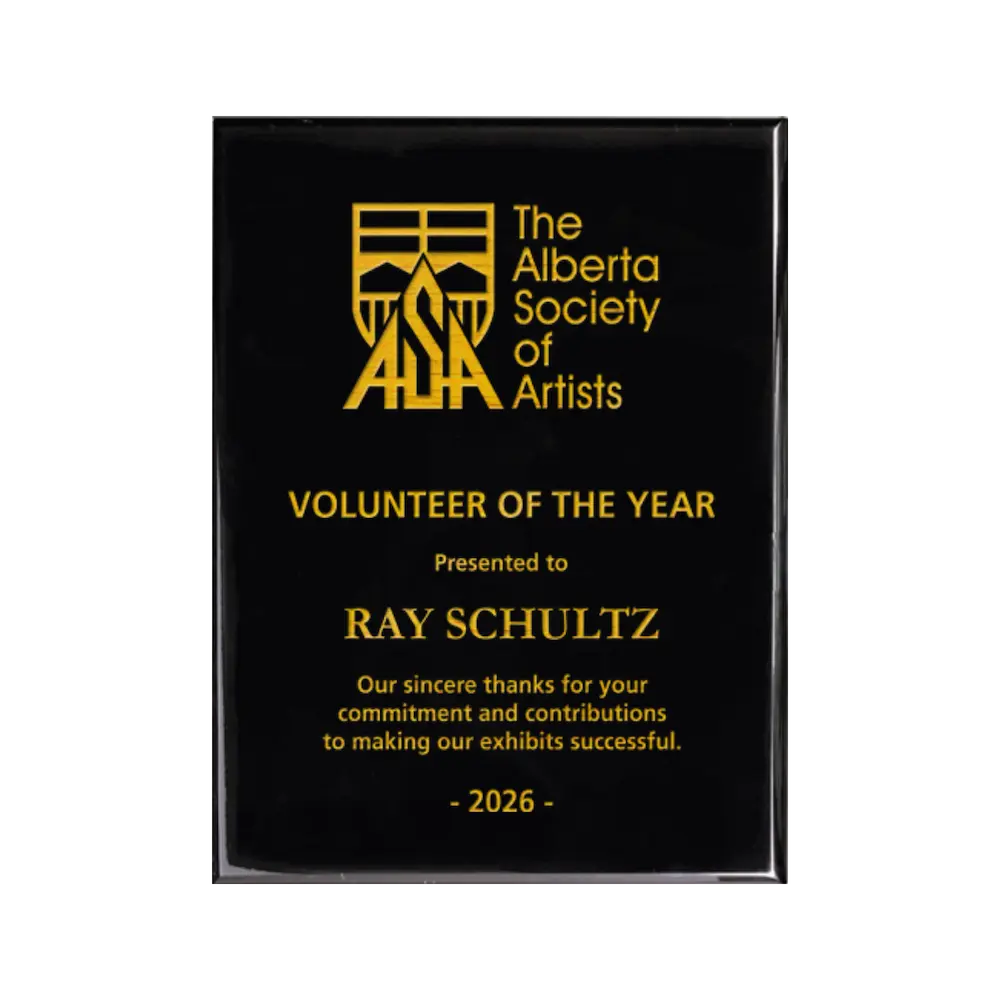 A photo of a Black Piano Finish plaque with full laser engraved text and graphics, and colour fill.