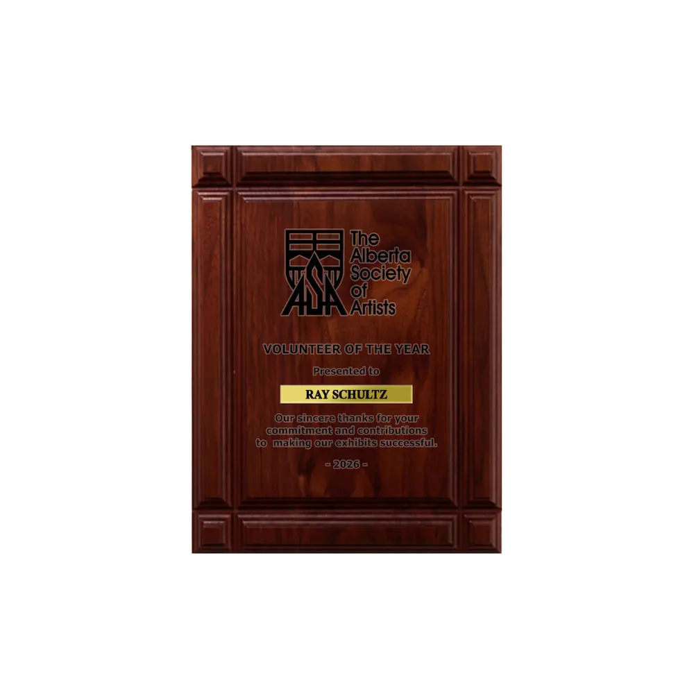 A photo of a solid wood Deep Groove Walnut plaque with a laser engrave text and graphics, and a traditional engraved name plate.