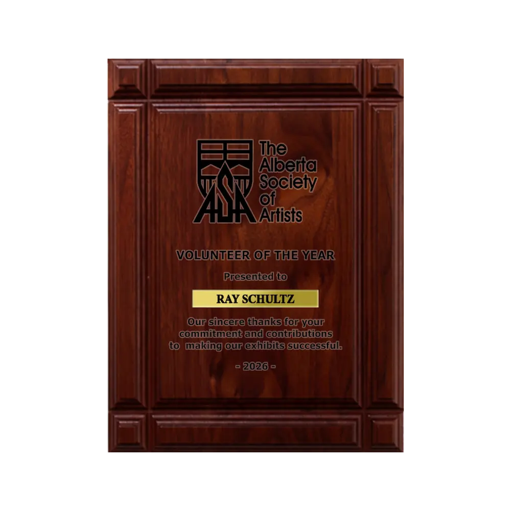 A photo of a solid wood Deep Groove Walnut plaque with a laser engrave text and graphics, and a traditional engraved name plate.