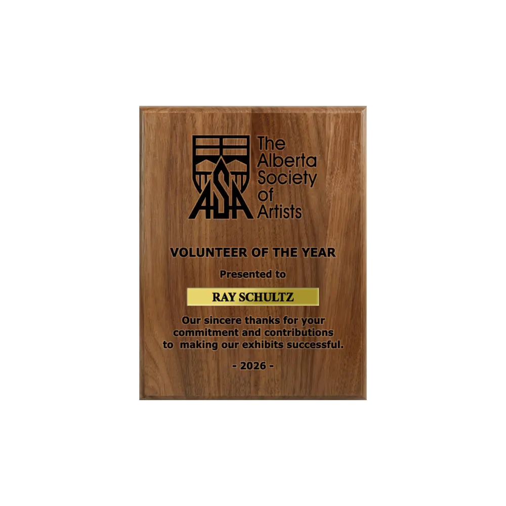 A photo of a solid wood traditional Walnut plaque with a laser engrave text and graphics, and a traditional engraved name plate.