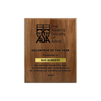 A photo of a solid wood traditional Walnut plaque with a laser engrave text and graphics, and a traditional engraved name plate.