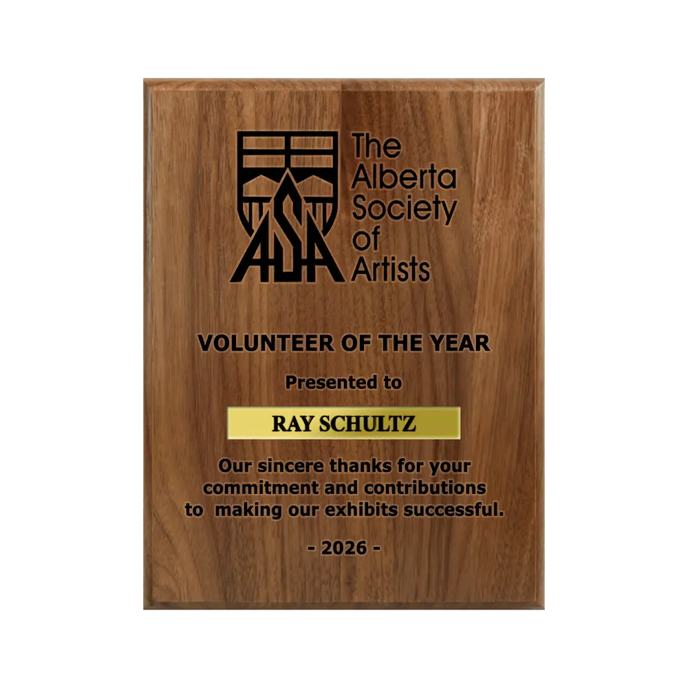 A photo of a solid wood traditional Walnut plaque with a laser engrave text and graphics, and a traditional engraved name plate.