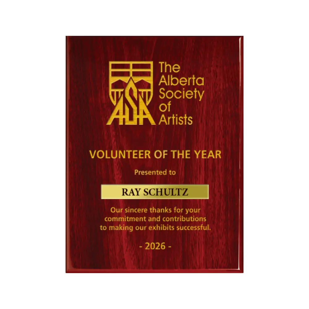 A photo of a Rosewood Piano Finish plaque with a laser engrave text and graphics, and a traditional engraved name plate.