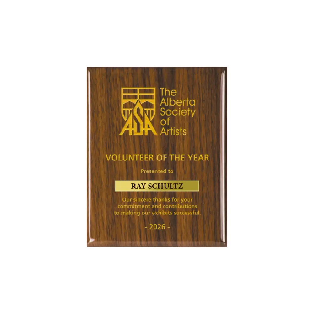 A photo of a Walnut Piano Finish plaque with a laser engrave text and graphics, and a traditional engraved name plate.