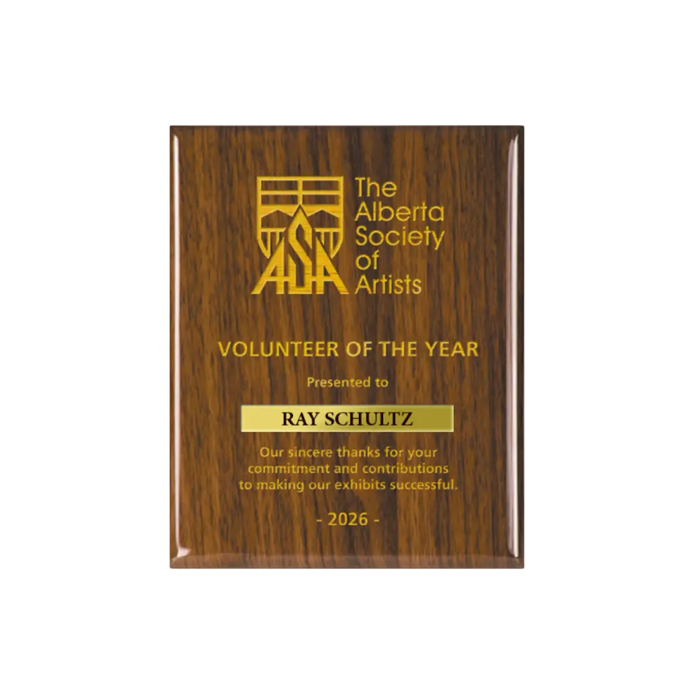 A photo of a Walnut Piano Finish plaque with a laser engrave text and graphics, and a traditional engraved name plate.