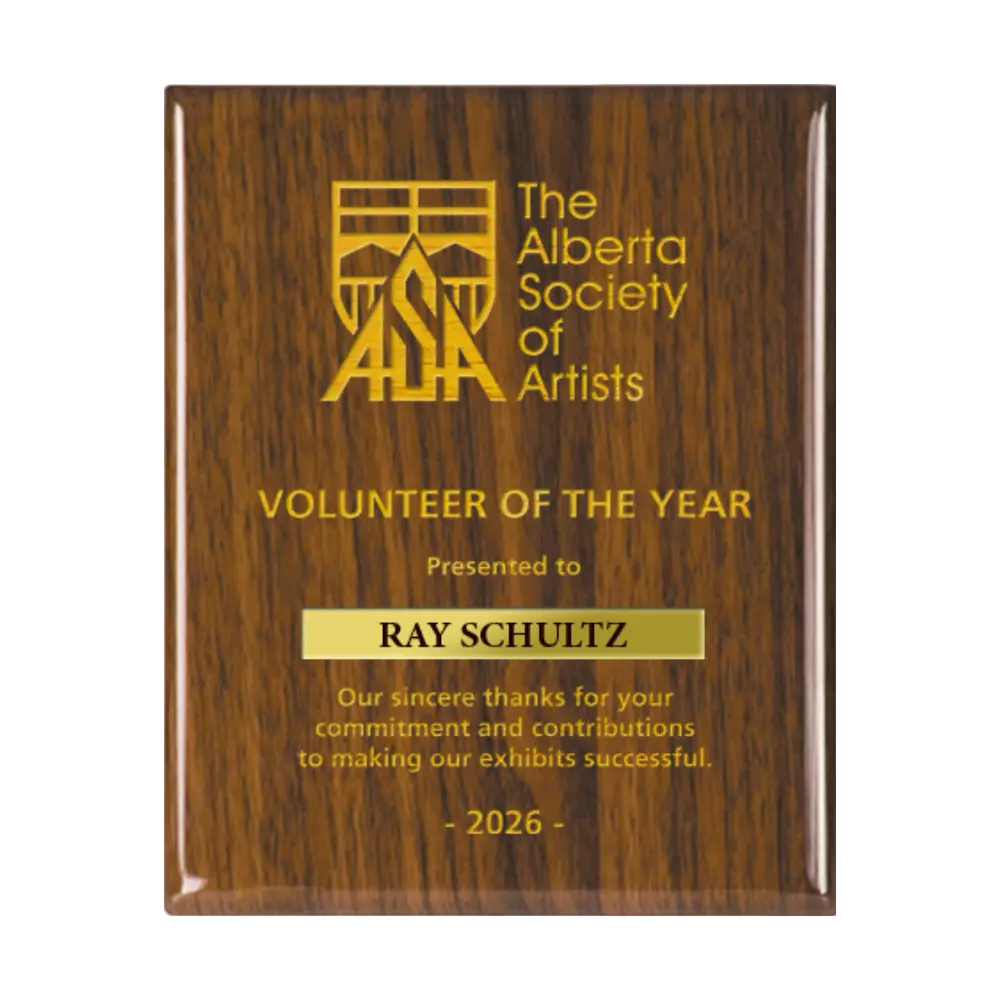 A photo of a Walnut Piano Finish plaque with a laser engrave text and graphics, and a traditional engraved name plate.