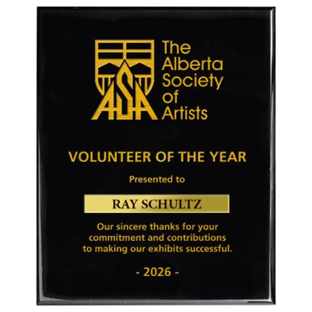 A photo of a Black Piano Finish plaque with a laser engrave text and graphics, and a traditional engraved name plate.