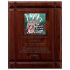 A photo of a solid wood Deep Groove Walnut plaque with a full-coloured plate on the top-half and laser engraving on the bottom-half.