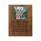 A photo of a solid wood traditional Walnut plaque with laser engraving on the bottom-half and full-colour plate on the top-half.