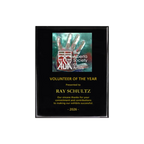 A photo of a Black Piano Finish plaque with a full-coloured plate on the top-half and laser engraving on the bottom-half.