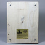 A back view photo of product 10-016B showing infographics of Morinville Grain Elevator Wood on gold plate.