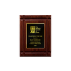 A photo of a solid wood Deep Groove Walnut plaque with a traditional engraved plate covering the plaque.