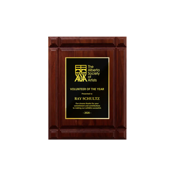 A photo of a solid wood Deep Groove Walnut plaque with a traditional engraved plate covering the plaque.