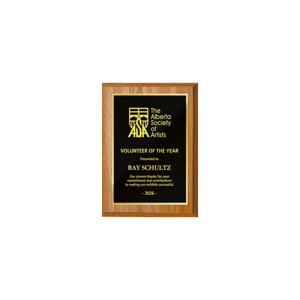A photo of a Light Oak Laminate plaque with full traditional engraved plate.