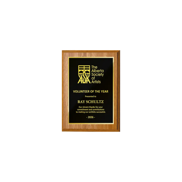A photo of a Light Oak Laminate plaque with full traditional engraved plate.