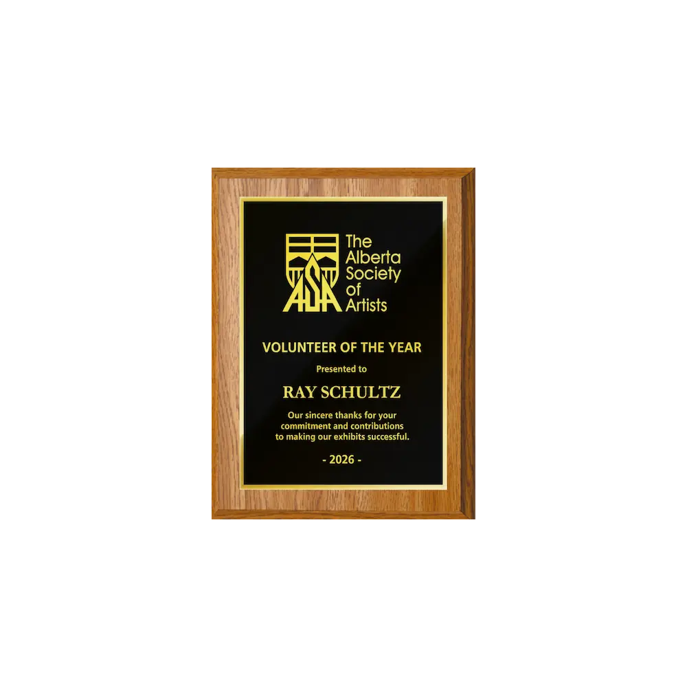 A photo of a Light Oak Laminate plaque with full traditional engraved plate.