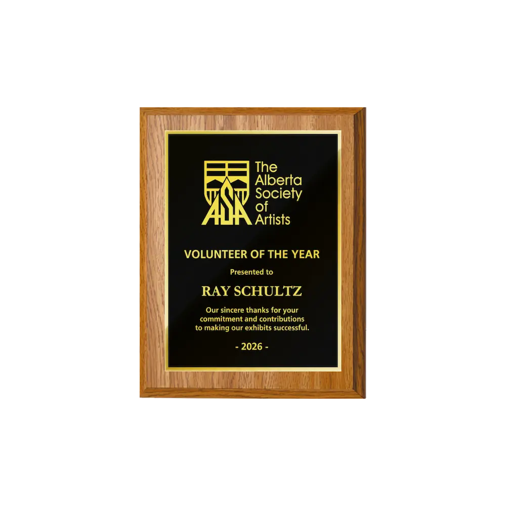 A photo of a Light Oak Laminate plaque with full traditional engraved plate.