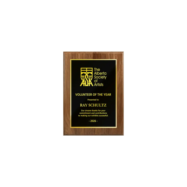 A photo of a solid wood traditional Walnut plaque with a full traditionally engraved plate.