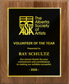 A photo of a solid wood traditional Walnut plaque with a full traditionally engraved plate.
