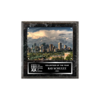 An image of a Black Marble finish square photo plaque with a traditionally engraved plate on the bottom-half and a photo holder on the top-half.