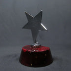 Sculpture - Cast Metal Star on Piano Finish Base