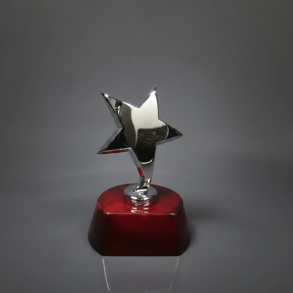 Sculpture - Cast Metal Star on Piano Finish Base