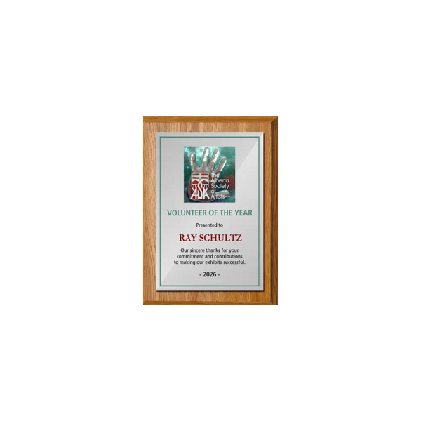A photo of a Light Oak Laminate plaque with a full colour plate.