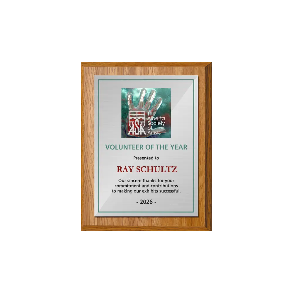 A photo of a Light Oak Laminate plaque with a full colour plate.