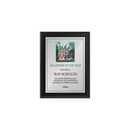A photo of a Matte Black Laminate plaque with a full colour plate.