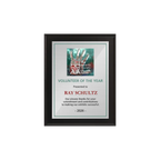 A photo of a Matte Black Laminate plaque with a full colour plate.