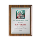 A photo of a Walnut Piano Finish plaque with a full colour plate.