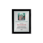 A photo of a Black Piano Finish plaque with a full colour plate.