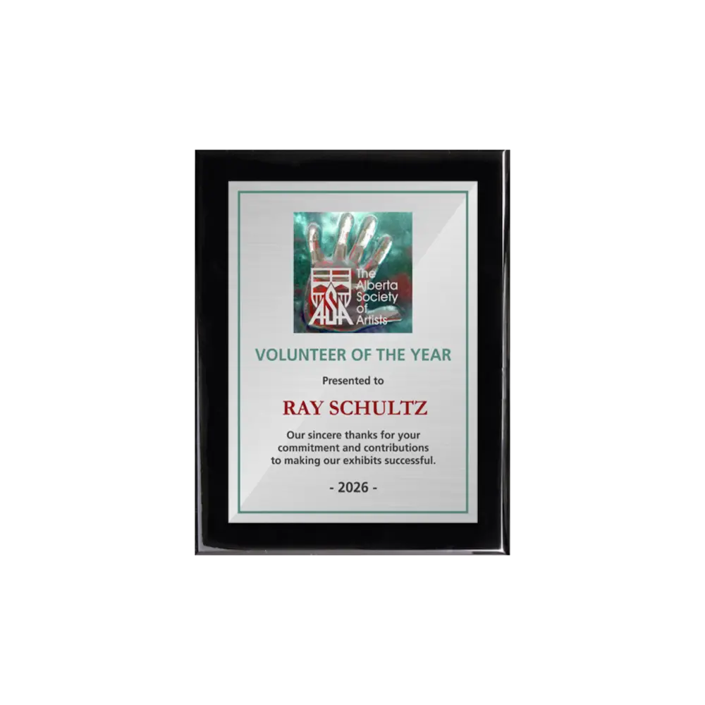 A photo of a Black Piano Finish plaque with a full colour plate.