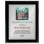 A photo of a Black Piano Finish plaque with a full colour plate.