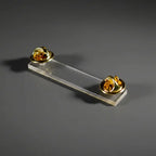 An image of a dual post butterfly clip fastener.