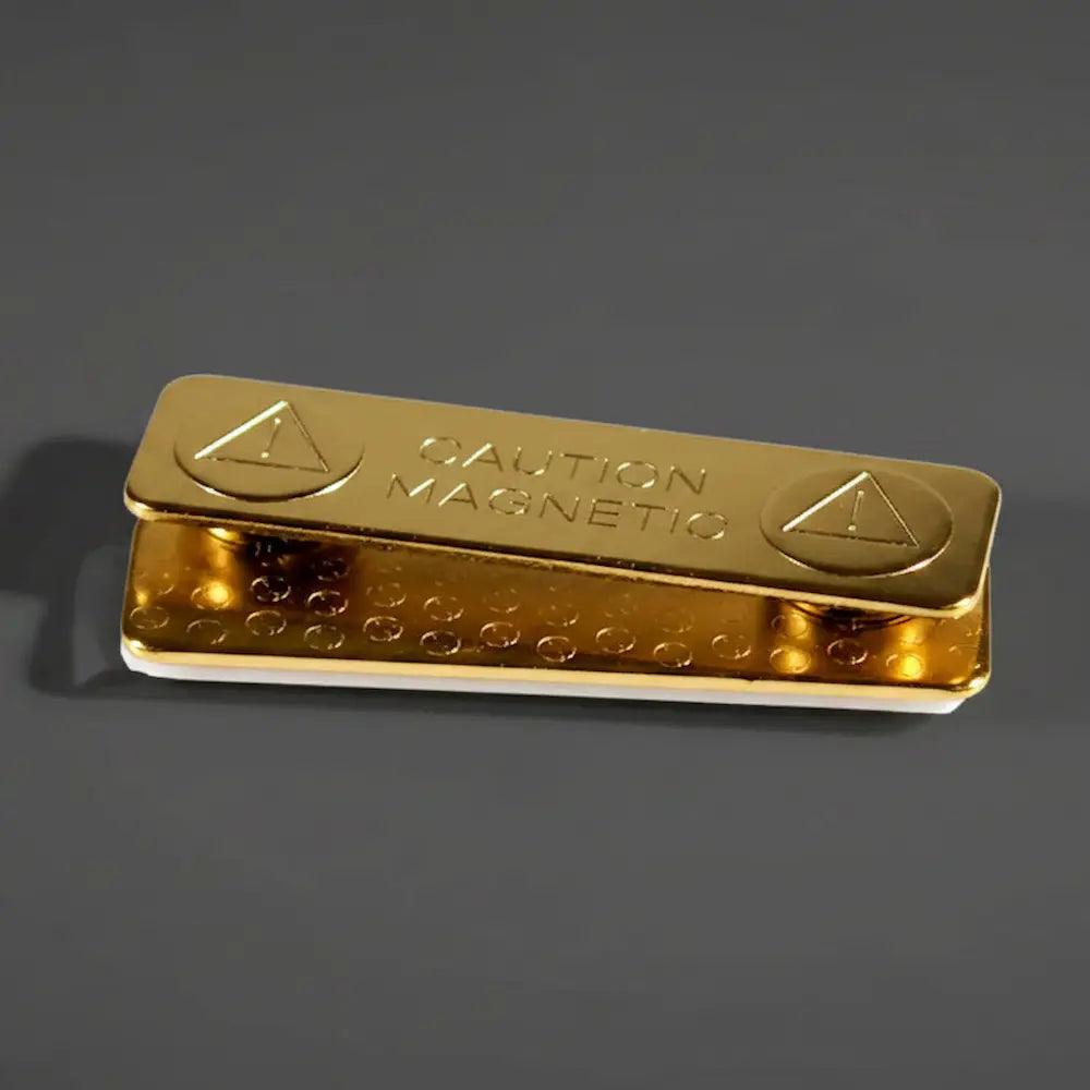 An image of a nickel-plated name badge magnet.