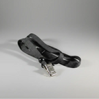 An image of a black lanyard with a silver metal bulldog clip.