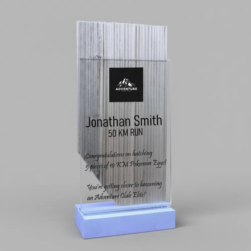 An AI generated text and graphics on the Morinville wood Alberta Shaped Heritage Award with clear acrylic front, and White metal base.